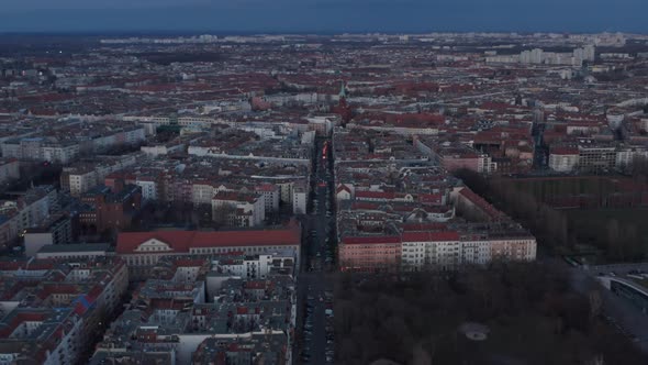Establisher Slow Motion Shot of Traditional Brick House Rooftop Across Street and Lane Surrounded alt