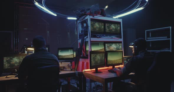 Soldier Pointing Gun at Comrades During Rocket Launch alt