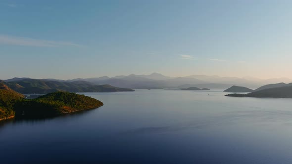 Aerial Footage of the Picturesque Bay of the Many Islands Near Marmaris at Sunrise Lone Sailing alt