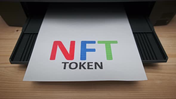 NFT Token Printing Inscription on White Sheet of Paper Printed By a Jet Printer alt