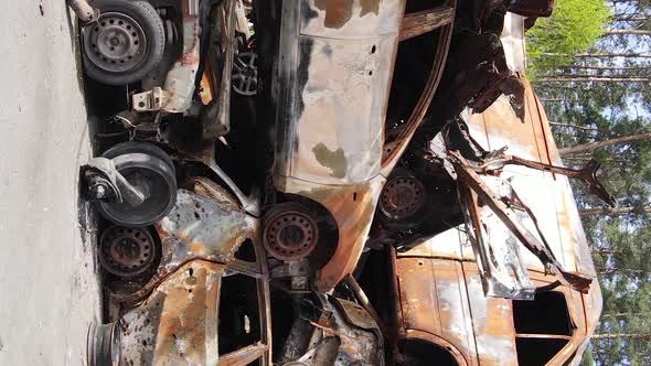 Vertical Video of Destroyed and Shot Cars in the City of Irpin Ukraine alt