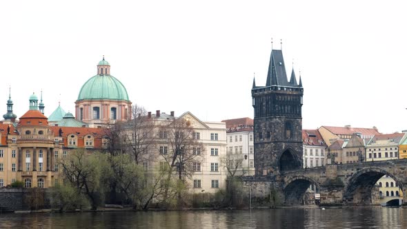 Panoramic View of Charles Bridge in Prague in Grey Cloudy Autumn Day alt