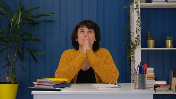 Middle Aged Woman Asking for Help Concerned About Problem or Concentrating Mind at Work Religious alt