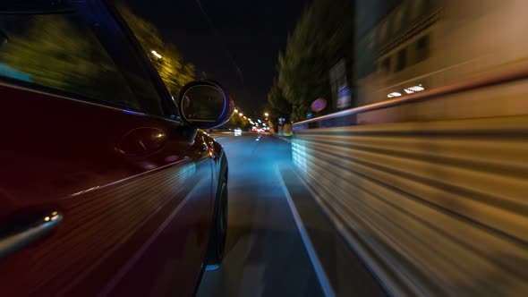Car Moves at Fast Speed at the Night Streets Timelapse Hyperlapse Drivelapse. alt