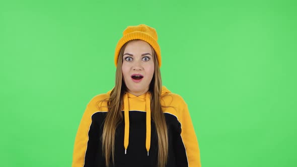 Portrait of Modern Frustrated Girl in Yellow Hat with Shocked Wow Face Expression alt