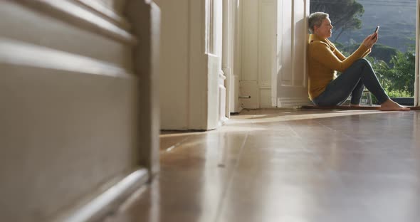 Senior woman at home alone alt