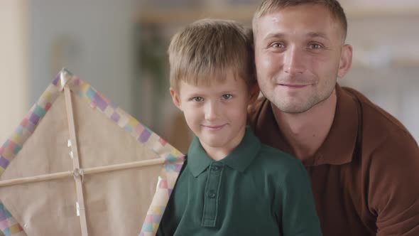 Smiling Father And Son With DIY Kite alt
