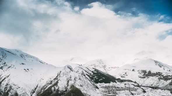 Stepantsminda, Georgia. Famous Gergeti Church In Beautiful Georgian Winter Landscape alt