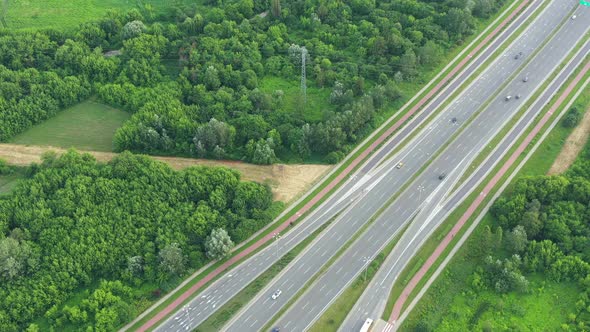 Aerial view of highway junction with traffic i alt