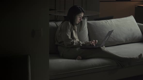 Female Working From Home At Night