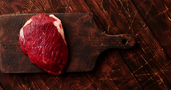 Raw Meat on Chopping Board alt