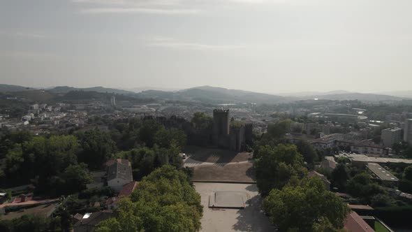 Flying Towards Guimaraes Castle, Portugal, Cityscape View, Aerial
