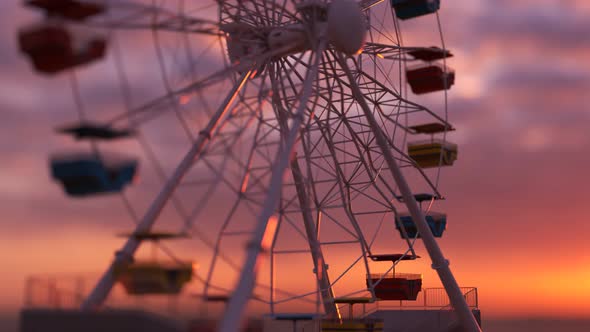 Fun Ferris wheel amusement ride, loopable carousel attraction. Epic sunset. 4KHD