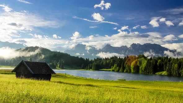 Time Lapse Fog Floating Over Mountain Lake Geroldsee in Bavaria Alps Germany alt