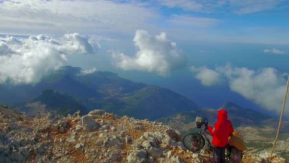 Cyclist Peak Of The Mountain alt