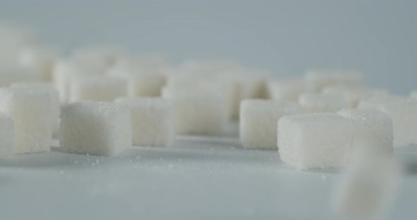 Sugar Cubes Fall on the Table alt