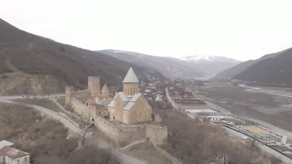 Aerial view of old Ananuri Fortress with two churches and picturesque view on river,  Georgia 2021 alt