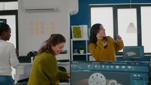 Enthusiastic Diverse Engineers Women Dancing in Company Office alt