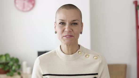 POV Mid Adult Woman Having a Video Call on Laptop While Working From Home Office alt