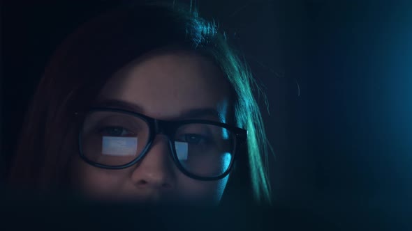 Close Up of Tired Woman Working at Night on Laptop Girl in Eye Glasses with Reflections Overworking alt