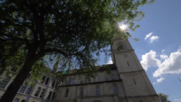 Zurich. The Grandiose Building of the Grossmunster in the Background of an Azure Sky with the alt