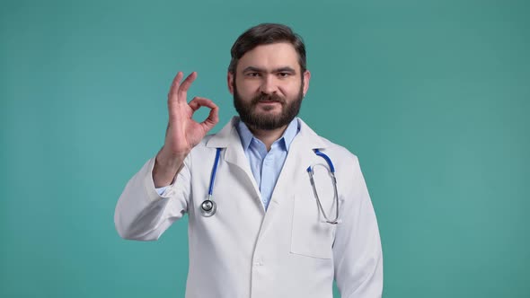 Doctor Showing Ok Okay Like Sign Over Blue Background alt