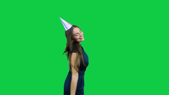 Happy birthday girl dancing in front of the green screen alt