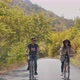 Traveller Couple Riding Bikes In Summer Forest - VideoHive Item for Sale