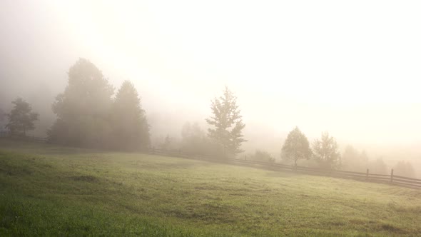 Rural Mountain Village in Fog alt