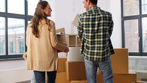 Happy Family with Child Moving To New Home alt