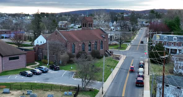Plain People, Amish in modern American community. Old fashioned transportation with horse buggy carr alt