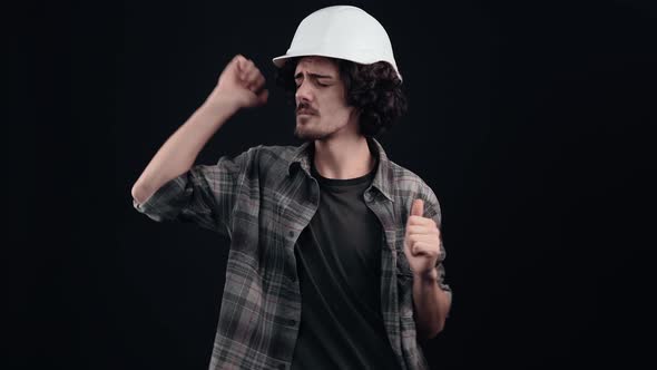 Hipster Dancer with Curly Hair Moves with His Hands Up Energetic and Full of Life Shows That alt