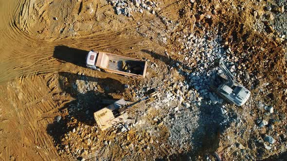 Trucks and Excavator Working alt