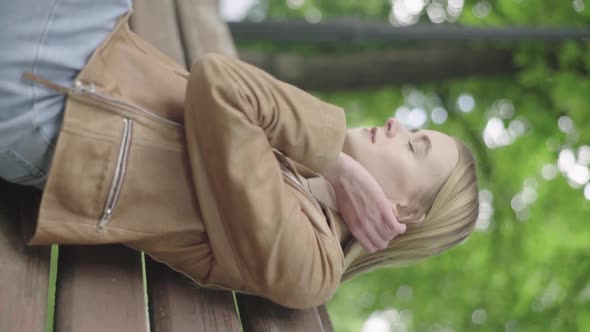 Vertical Video of a Young Skinny Girl in the Park alt