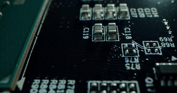 Macro Dolly Shot Side View of a Computer Electrical Circuit with Cip Slots Microchip and alt