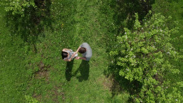 A Marriage Proposal in Apple Garden alt