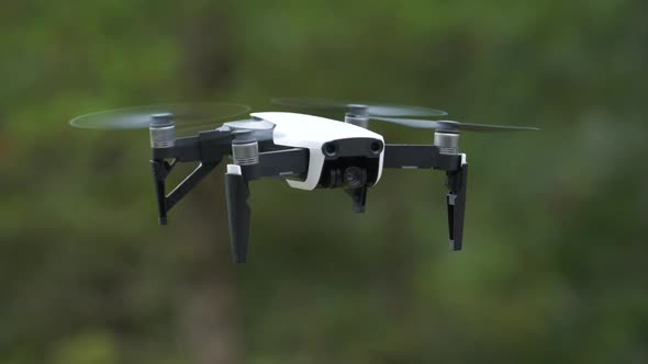 Small Quadcopter Drone UAV Hovering Slow alt