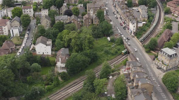 London City Overground Train service. Train on Rail Tracks Passing Crystal Palace Railway Station alt