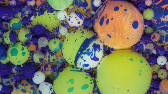 Moving Pastel Background Consisting of Purpleblue Balls Moving in a Chaotic Manner alt