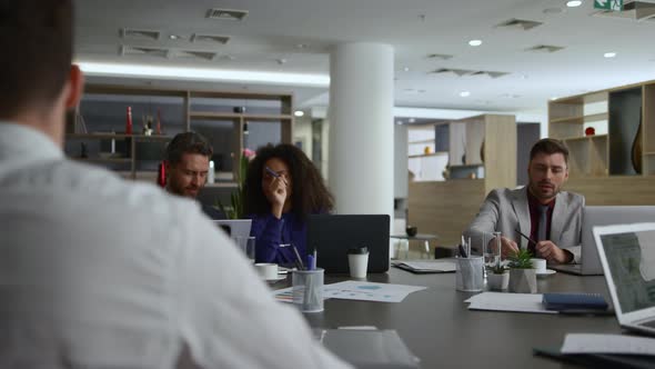 Multiracial Colleagues Team Working Together Brainstorm Business Ideas in Office alt