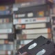 Male Hand Picks Up a VHS Cassette From the Shelf. - VideoHive Item for Sale