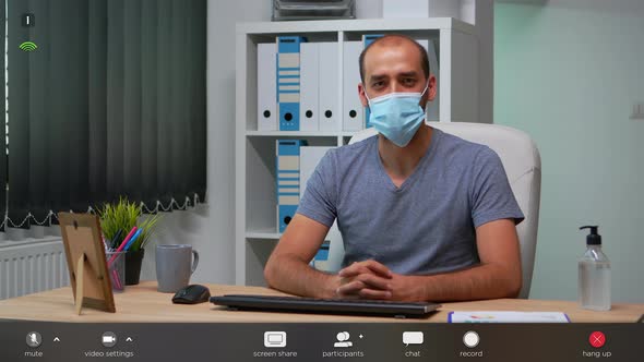 Freelancer Talking at Camera with Prrotection Face Mask alt