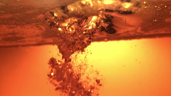 Super Slow Motion Jet Beer Pours with Air Bubbles alt