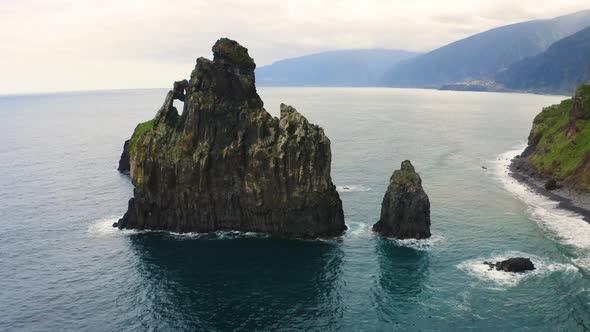 Flying Above Ribeira Da Janela Volcanic Sea Stacks in Madeira Island Portugal alt