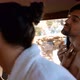 Woman standing while man shaving his beard in cottage 4k
