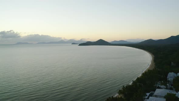 Aerial View On Ocean Coast Near Palm Cove Early In The Morning Before Sunrise In Cairns, Australia