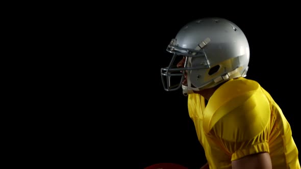 American football player catching the ball and throwing 4k alt