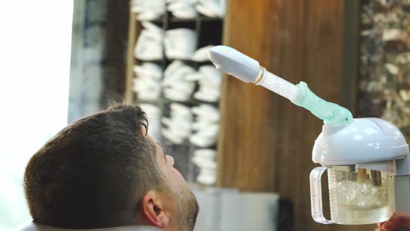 Steam Vaporizer Used in Barbershop for Skincare for Male Client