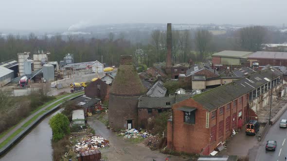 Aerial view of Kensington Pottery Works an old abandoned, derelict pottery factory and bottle kiln l alt