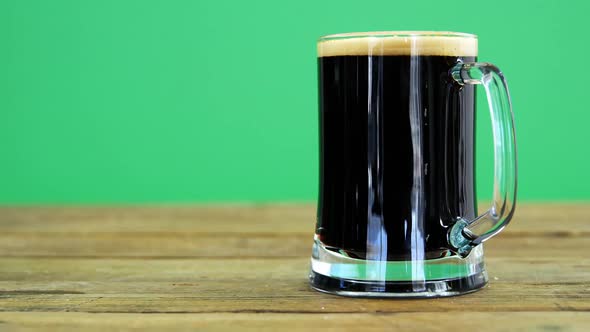 Guinness pint on table for st patrick alt